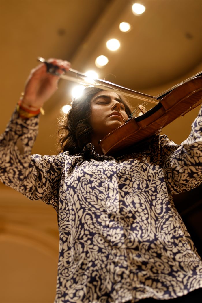 Alicia Rando playing the violin